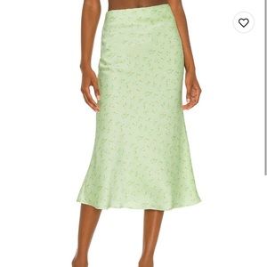 REVOLVE Camila Coelho Gyselle midi skirt.